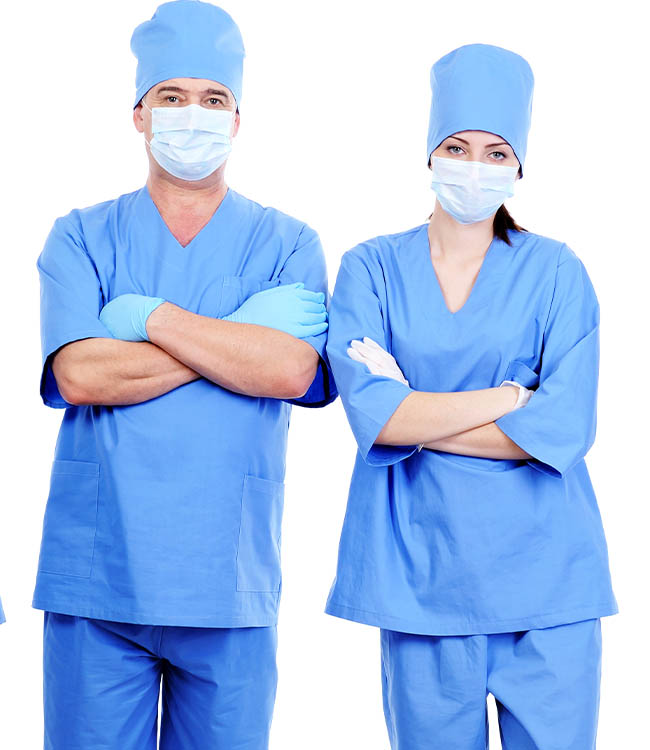 Untitled-3_0001_team-four-surgeons-blue-uniform-standing-together